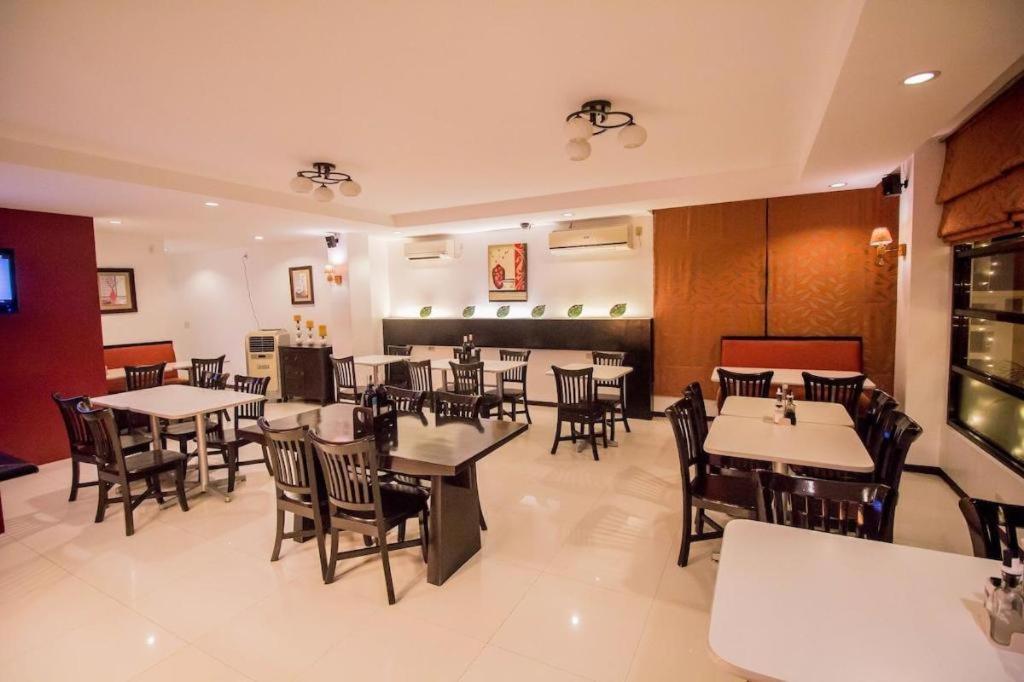 The Red Palm Suites And Restaurant Butuan City المظهر الخارجي الصورة