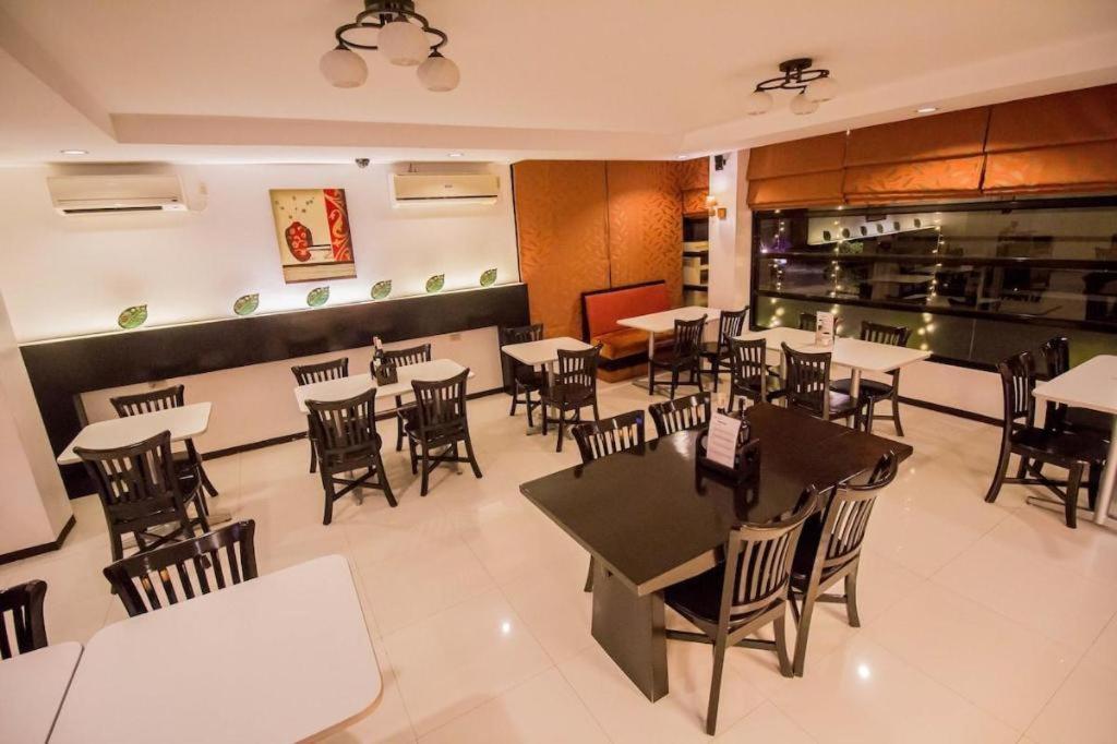 The Red Palm Suites And Restaurant Butuan City المظهر الخارجي الصورة