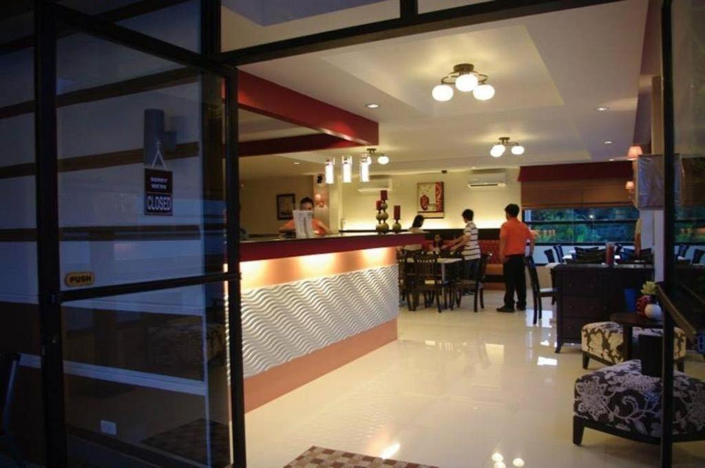 The Red Palm Suites And Restaurant Butuan City المظهر الخارجي الصورة