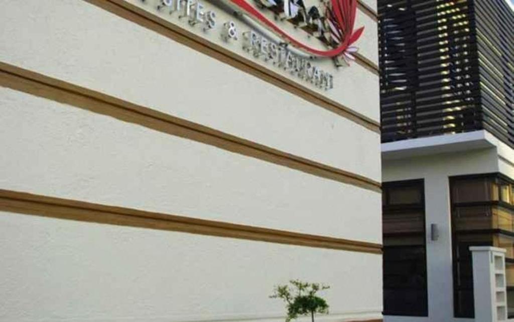 The Red Palm Suites And Restaurant Butuan City المظهر الخارجي الصورة